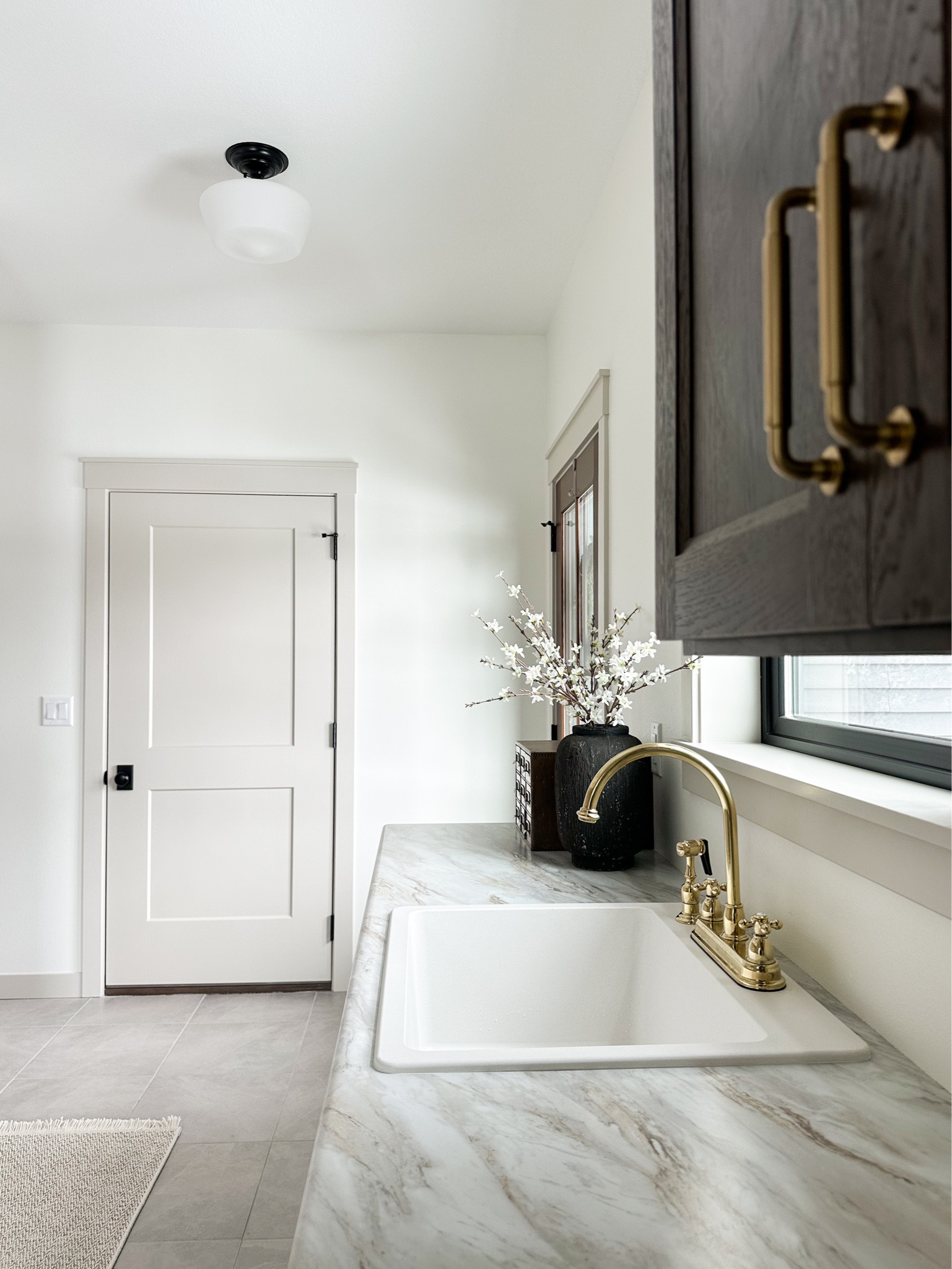 Loving the lighting in our mud room area😍

#LTKhome #LTKfamily #LTKfindsunder100