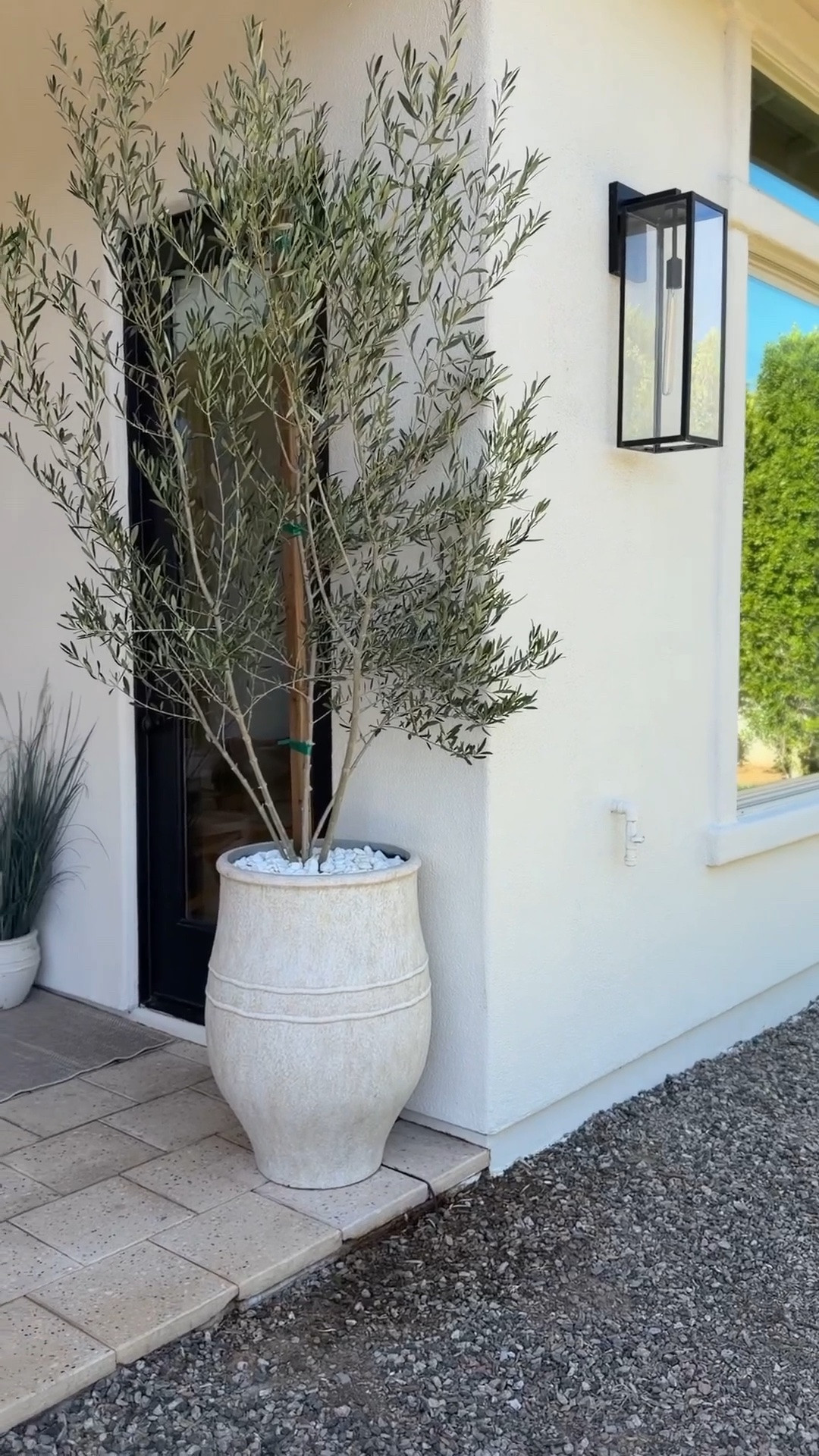We love this planter so much that we bought four of them!  If you’re looking for something with a large scale and very durable, this is it! ￼￼

Mediterranean planters • oversized outdoor planter • large tall planter • Pottery Barn planter • statement outdoor planter • luxury outdoor decor • front porch planter ideas • entryway planter inspiration • modern Mediterranean style • olive tree planter • large outdoor pots • elevated curb appeal • resort-style outdoor living • neutral outdoor decor • designer-inspired landscaping • front yard landscaping ideas • organic modern exterior • patio planter styling • oversized garden planter • timeless outdoor design • architectural planters • luxury home exterior • outdoor decorating ideas • statement landscaping pieces • Mediterranean landscaping inspiration

#LTKdayinmylife #LTKHome #LTKSeasonal
