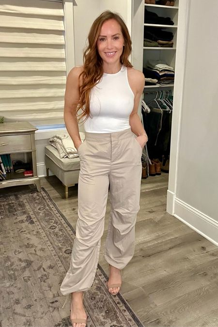 Living in these parachute pants from Target! I dressed them up with a nude Vince Camuto sandals. USE CODE: EXTRA20 for 20% off sale shoes at Vince Camuto

#LTKfindsunder100 #LTKshoecrush #LTKstyletip