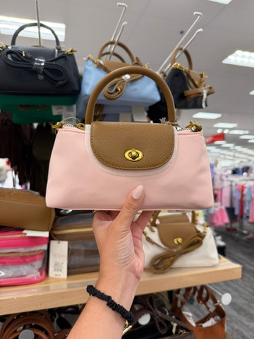 This week’s **#1 best seller** and honestly so easy to see why 🎀 This A New Day bag is such a cute everyday staple - the soft pink, structured shape and top handle give it that polished look without the high price tag. Such a good one to dress up or wear casually.

wedding guest dress summer, teacher outfits, country concert outfits, date night outfits, fall outfits women, back to school teacher gift, business casual workwear, vacation outfits beach, summer outfits over 40, work outfits
 

 #LTKgrwm #LTKootd #LTKSeasonal
