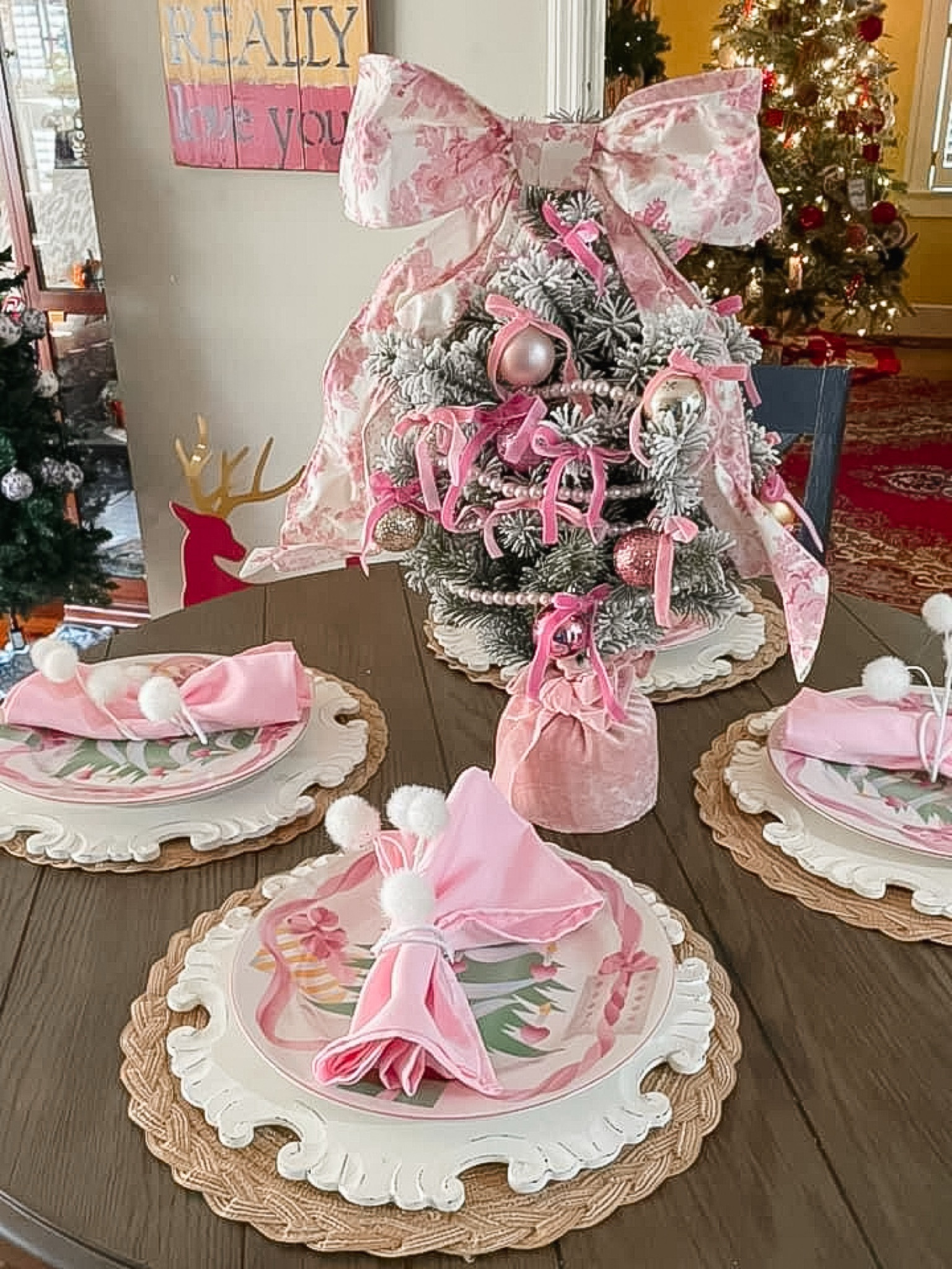 I have linked everything I could! 🩷🎄🎀

- chargers are from Pier 1 and discontinued, but I found some on eBay and also attached similar ones from Amazon. 
- Placemats are old, but I linked similar 
- china plates are also discontinued- mom has collected them for me. 
- I linked the exact tree & napkins 

#LTKSeasonal #LTKHome #LTKHoliday