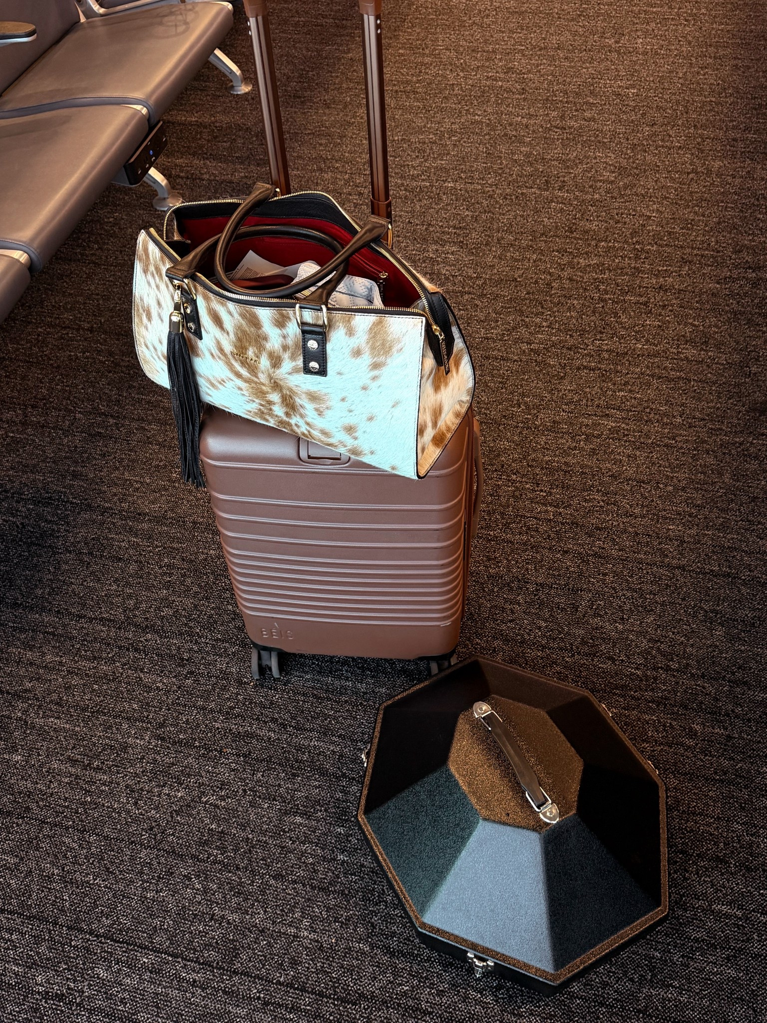 roller bag and cowboy hat can/travel box. cowhide bag is kelly tooke 

#LTKTravel #LTKdayinmylife #LTKFestival