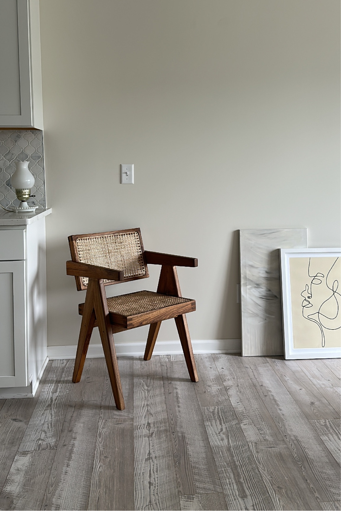 Chair: 
This reedition Jeanneret Floating Armchair was initially designed for the Chandigarh Administrative Buildings in India, by Pierre Jeanneret, for his cousin and collaborator Le Corbusier. 

It’s timeless and a great accent for the modern home. I enjoy placing it in various places of my home to create movement, ambiance and texture.
For now, it sits pretty in this corner of my dining room. 
And yes, it is comfortable and high quality (worth every penny). 
I recommend to get it where I got it from as I can speak for the maker’s level of quality and attention to detail.  

- Handcrafted
- Natural wicker / Rattan cane weaving
- Natural Teak (color) 

Dimensions:
H: 31" x L: 19.6" x D: 21.1"
Seat Height: 17.3"
Armrest Height: 26"

Hope you love it as much as I do!! xx


#LTKstyletip #LTKFind #LTKhome
