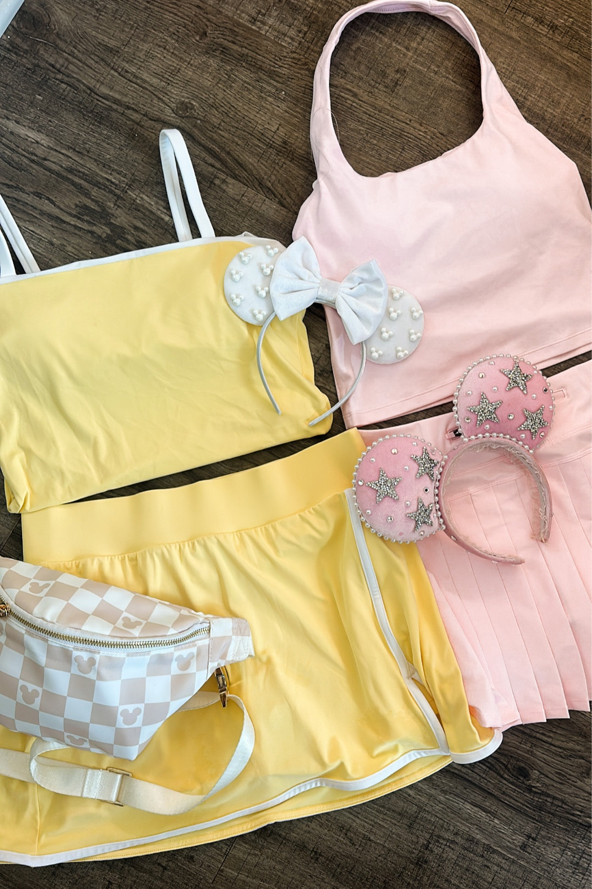 DISNEY OOTD:
Yellow athletic top and tennis skirt
Checkered Mickey Fanny pack 
Pink new balance sneakers
White pearl Mickey ears 

Disney world | vacation | workout | summer 

Pink athletic halter top
Pink pleated tennis skirt with zipper pocket
Velvet rhinestone star Minnie ears 

#LTKtravel #LTKfitness #LTKsalealert
