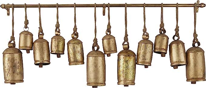 Deco 79 Metal Tibetan Inspired Meditation Decorative Cow Bell with Jute Hanging Rope and Rod, 48"... | Amazon (US)