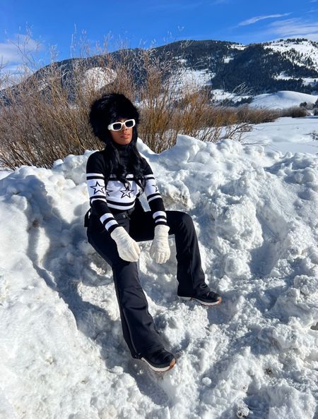 Ski outfit! The perfect black and white combo to look stylish on your ski trip! Love the fuzzy hat, snow boots, ski sweater 

#LTKHoliday #LTKtravel #LTKshoecrush