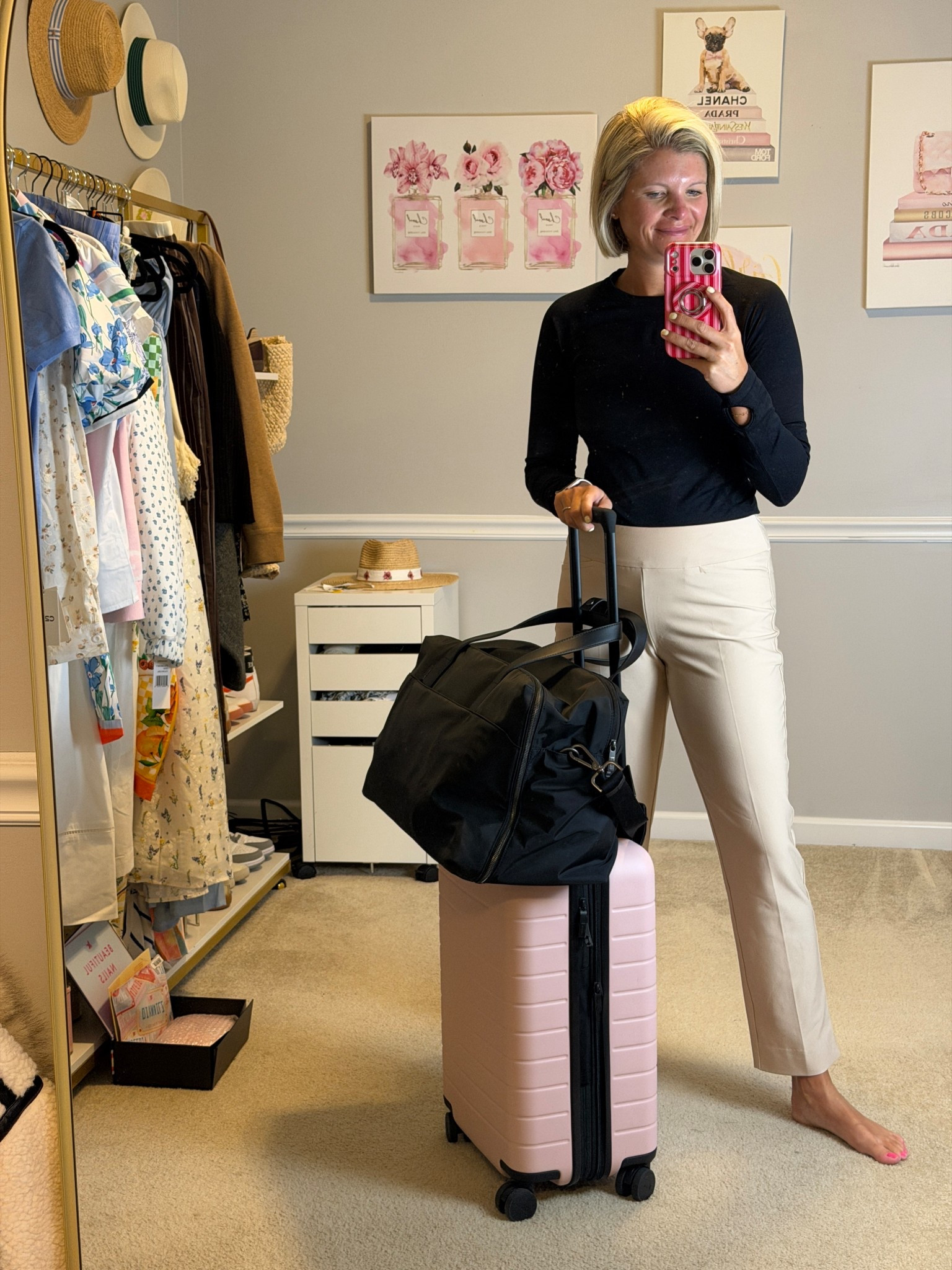 Cropped active pants with elastic waistband TTS (wearing 10)
Pink and black carry on luggage

#LTKMidsize #LTKOver40 #LTKTravel