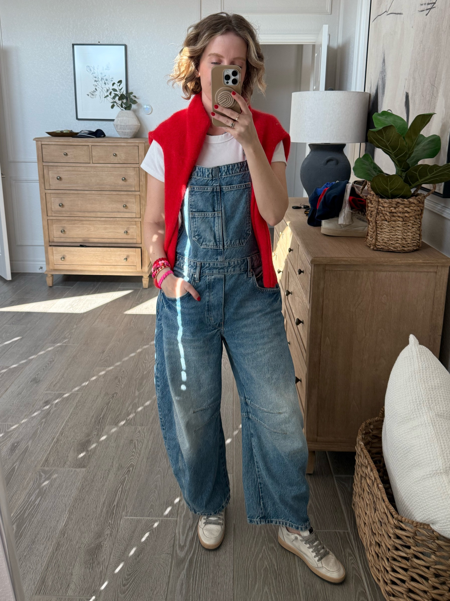 Wearing a medium in overalls, XS in cardigann