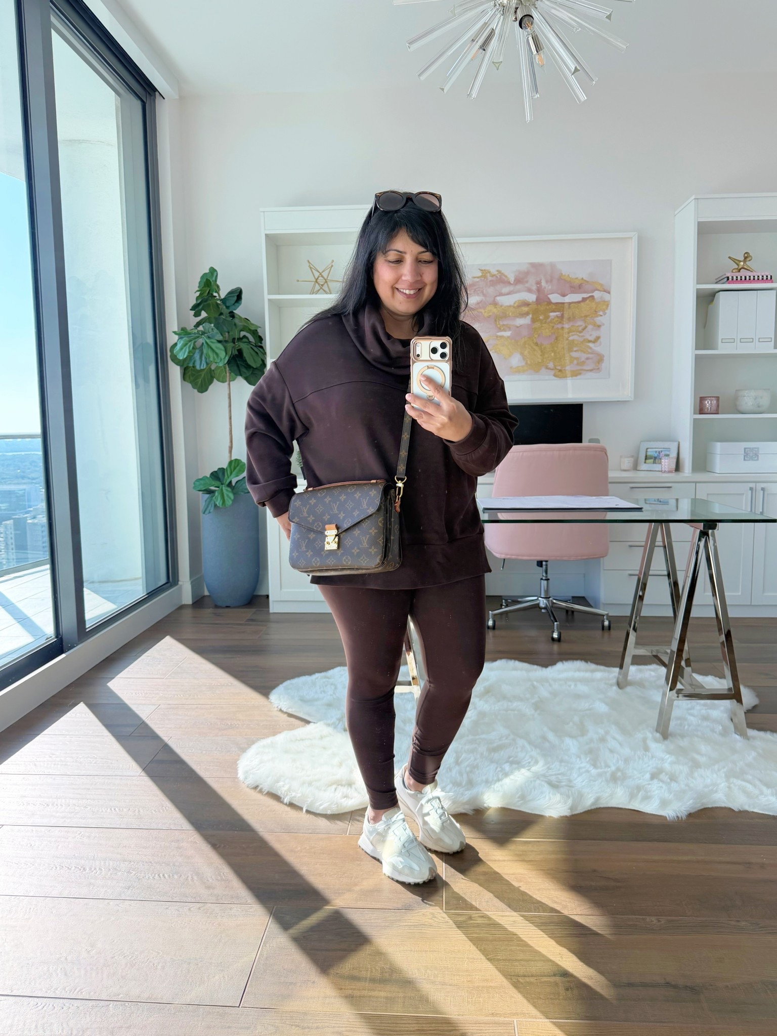 Today’s cozy set for running errands! Love this chocolate brown Varley set that’s a great for lounging at home, running errands and it’s the perfect airport outfit and travel outfit for long flights too! Varley oversized cowl neck tunic sweatshirt with gold zipper details size large and Varley leggings size large. Wearing both in the color coffee bean. So soft, comfy and cute! New Balance 327 sneakers true to size. 

#LTKTravel #LTKActive #LTKOver40