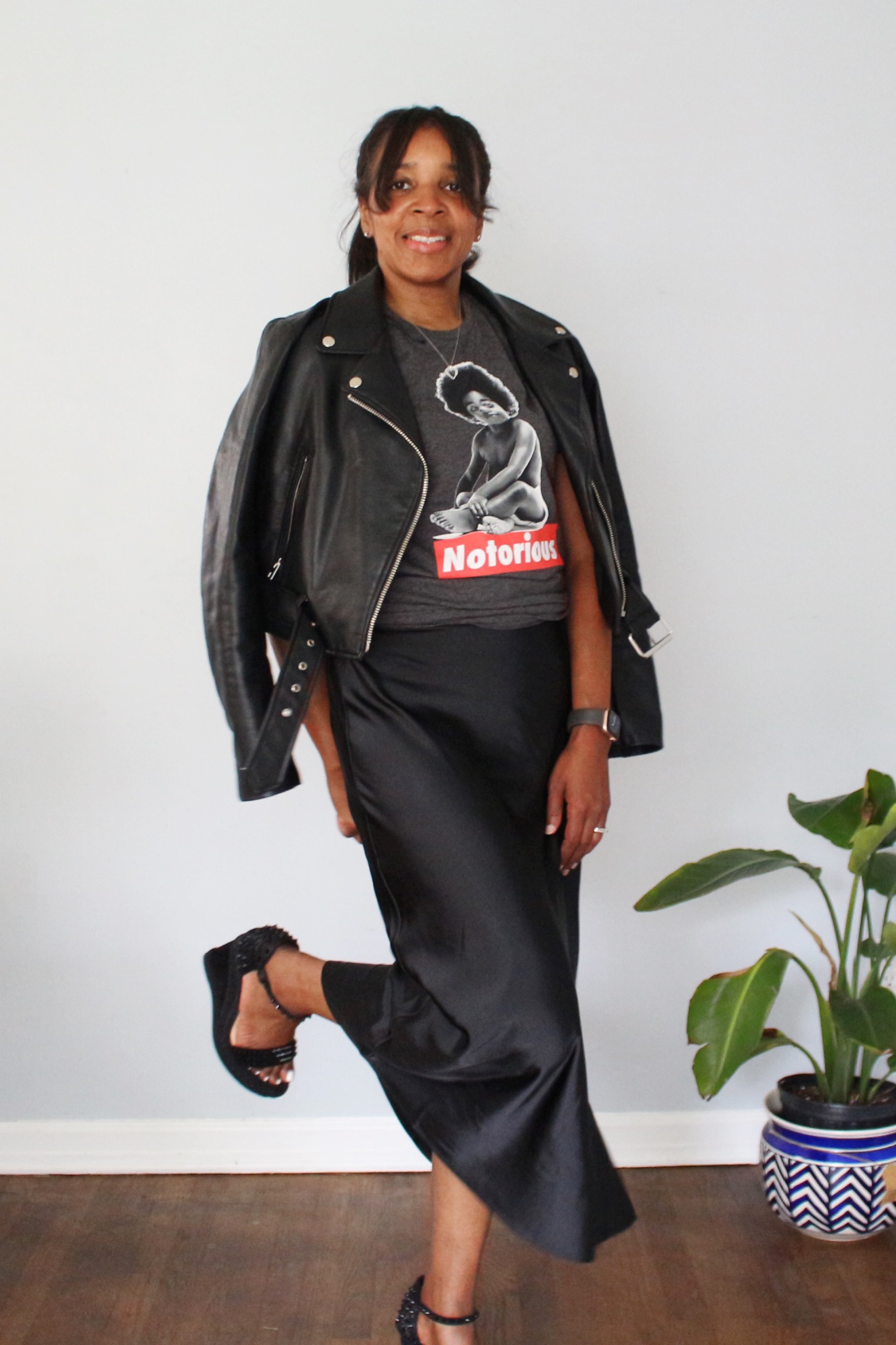 Black slip skirt graphic tshirt black pumps Christian Louboutin moto jacket faux leather #skirt #motojacket #LTKshoecrush 

#LTKstyletip #LTKGiftGuide #LTKSale