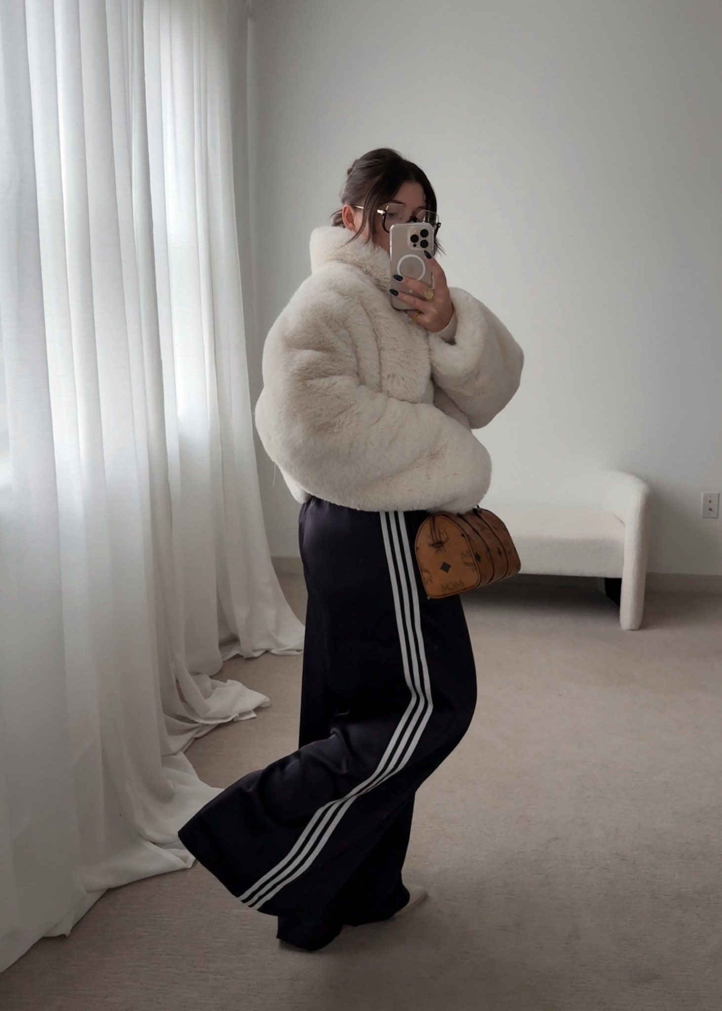 Winter outfit 
Faux fur
Track pants 

#LTKSeasonal