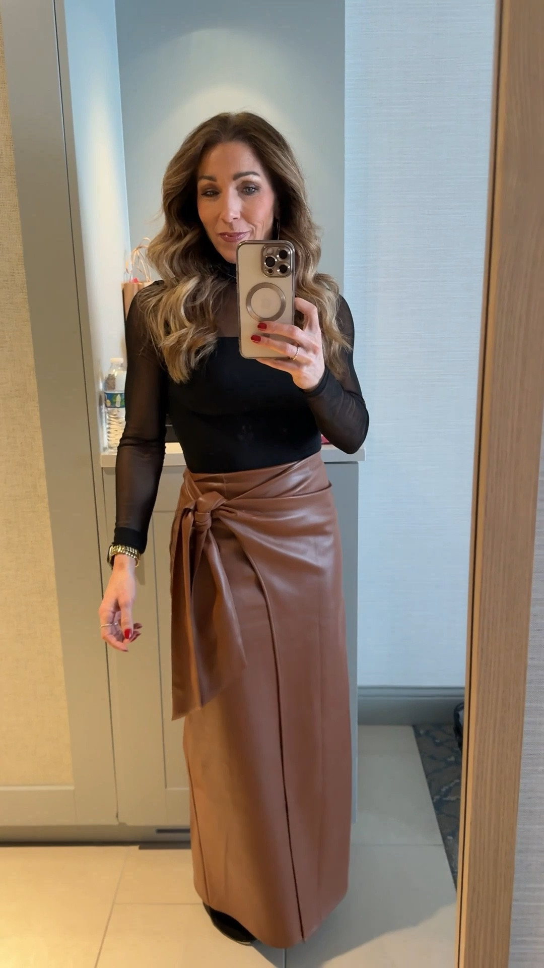 A timeless piece that instantly elevates any look 🤎 This camel leather wrap skirt has received so many compliments. The color, the fit, and the wrap detail make it effortlessly chic yet still a modern feel.

Wearing XS in skirt 🤎 and S in bodysuit 🖤

#LTKOver40 #LTKootd #LTKWorkwear