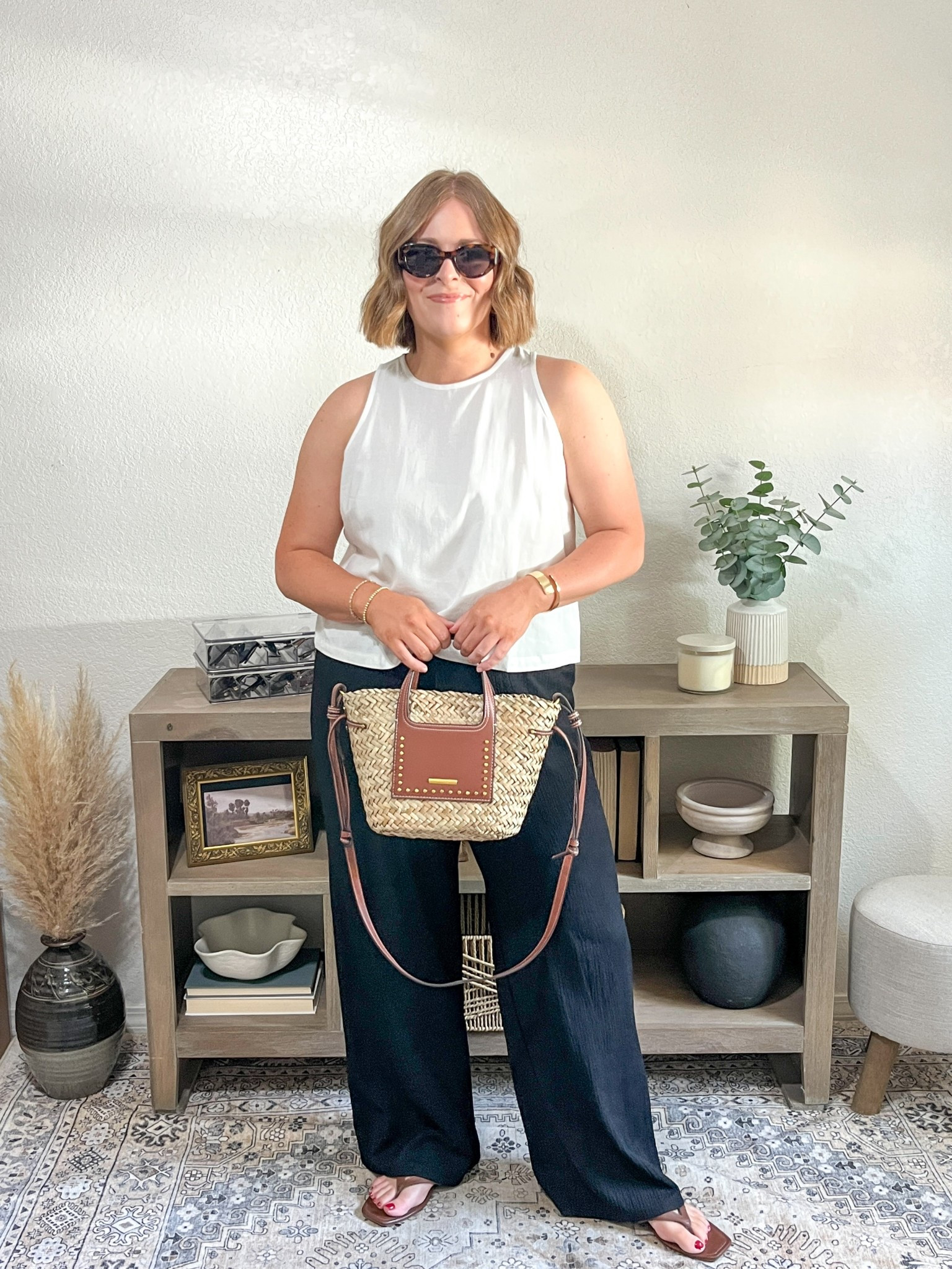 Comfortable & effortless Summer look// everything is flowy and lightweight, perfect for the summer heat! 

tank L
pants M (run big)
sandals size up if you have a wider foot 
bag is from TJ Maxx, linked similar 

#LTKSeasonal #LTKSummerEdit #LTKMidsize