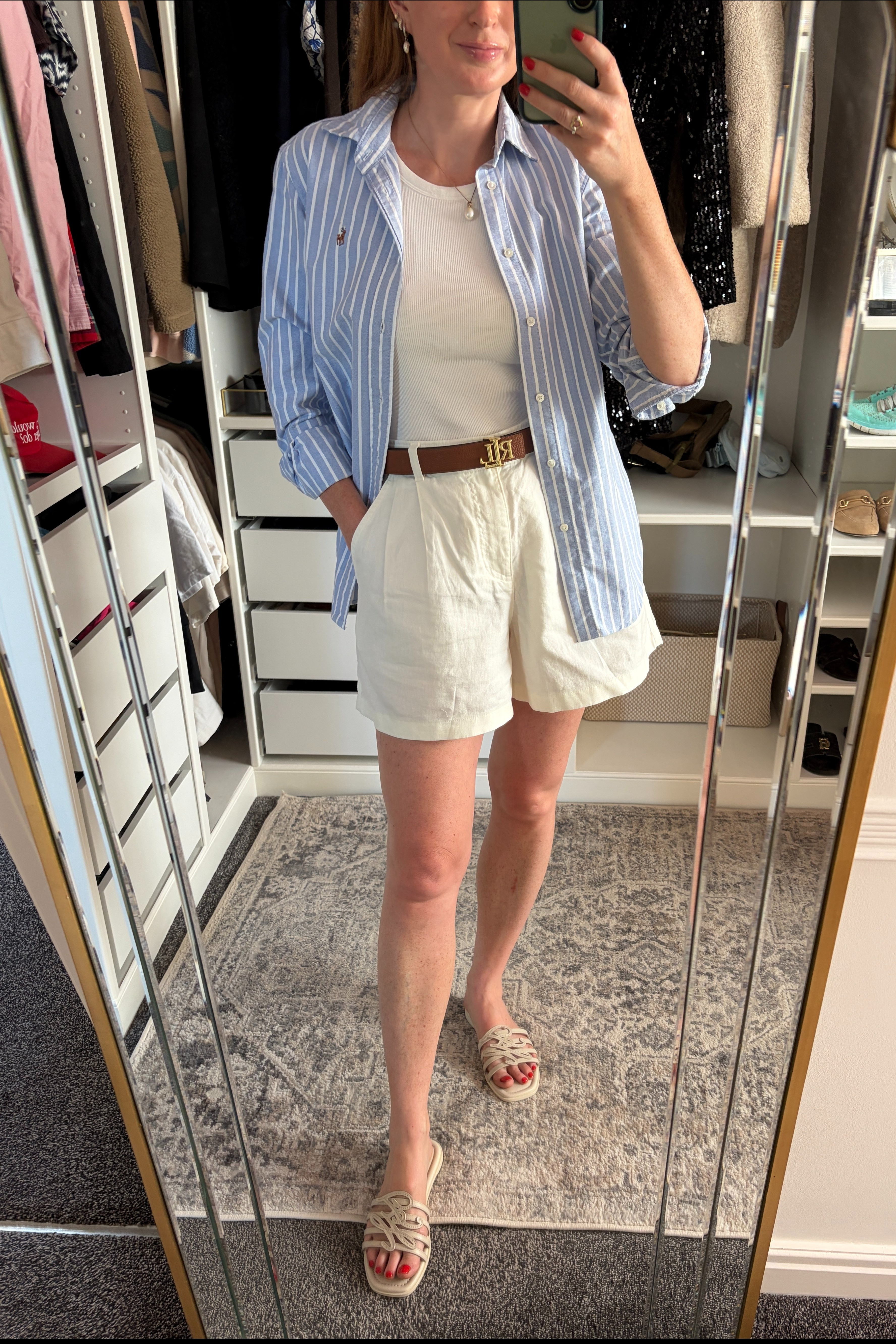 The easiest summer outfit formula 🤍 Uniqlo white vest & shorts, styled with a blue and white Oxford shirt, tan belt and neutral sandals. Simple staples, but the layers and accessories make it feel intentional. summer outfits over 40, business casual workwear @UNIQLO

#LTKuk #LTKsummer #LTKstyletip