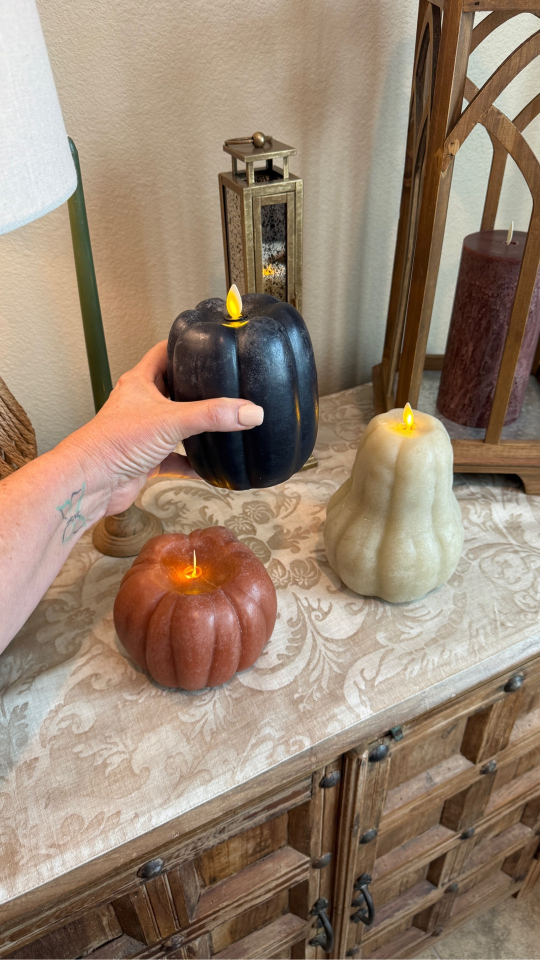 Looks like a real candle, but never melts. The flickering flame effect is ultra realistic without the fire hazard. These candles are shaped like a gourd pumpkin and come in fall perfect finishes, like natural terra-cotta or cream, and they fit any autumn aesthetic. 

#LTKHome #LTKSeasonal #LTKFindsUnder100