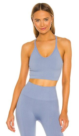 X REVOLVE Ribbed V Sports Bra in Capri | Revolve Clothing (Global)