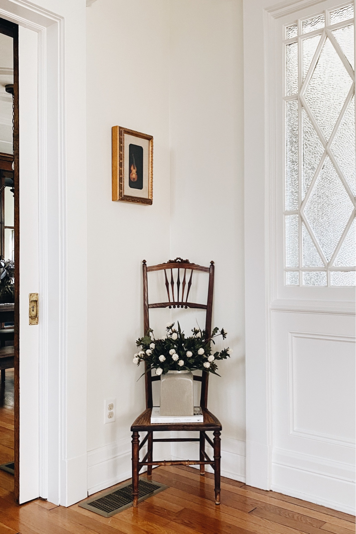 Awkward corner styling - corner chair styling - vintage chair styling - chair moment - fall decor - seasonal decor - faux Fall florals 

#LTKSeasonal #LTKstyletip #LTKhome