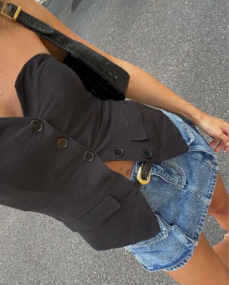 Trendy chic spring outfit. Use code SAV20 for 20% off your first order! 

Denim cargo mini skirt 
Black strapless button down corset top
Street style 
OOTD 
European style 
Lulus

#LTKstyletip #LTKSeasonal #LTKfindsunder50