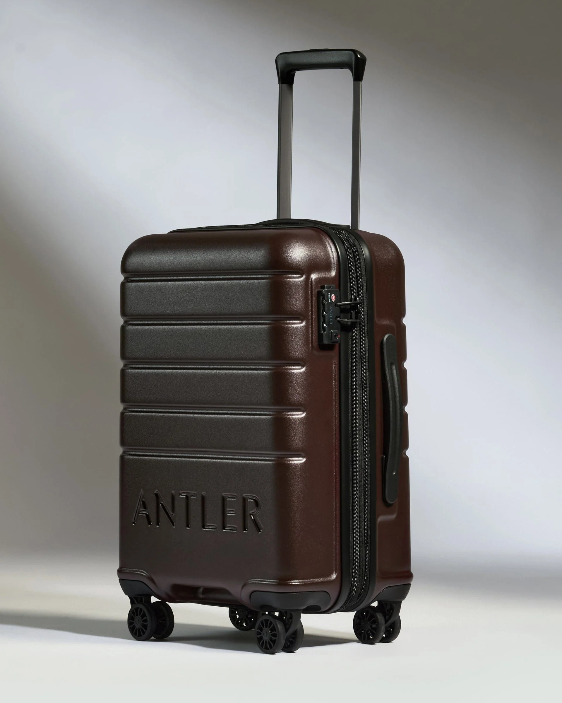 Medium Suitcase in Cedar Brown - Logo | Lightweight Hard Shell Luggage | Antler UK