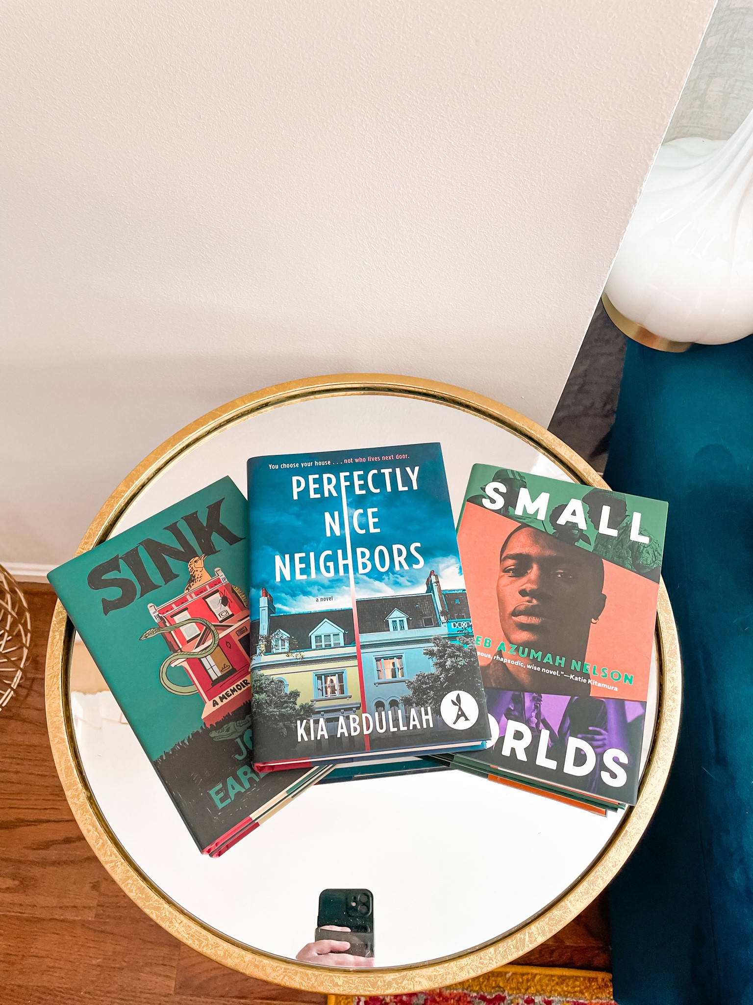 Books, gold table, blue couch, reading room 

#LTKhome #LTKfindsunder50