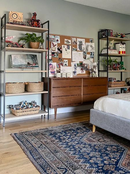 Teen bedroom decor ideas: two bookcases to use as displays but use baskets to organize. Bulletin boards to organize/display in a contained way. 

#LTKfamily #LTKhome