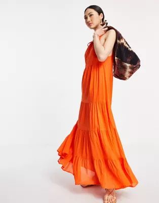 ASOS DESIGN tiered halter neck maxi dress in orange | ASOS (Global)