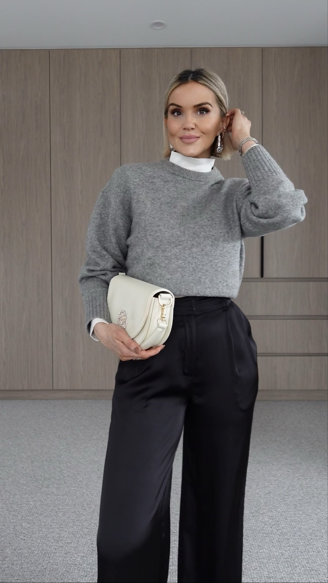 The ultimate cozy-meets-glam dinner look: balancing a plush knit jumper with fluid satin pants, finished with cool silver accessories for that effortless sparkle.

Are you team gold or team silver for a night out?

Wearing: 
White turtleneck top: @targetaus 
Knit: @hm
Pants: @forcastofficial 
Earrings: @lovisajewelleryanz 
Flats: @kmartaus ( last season) 
Bag: @orangecubeofficial 

#melbournemums #outfitinspirations #stylishoutfit #australianstyle

#LTKaustralia