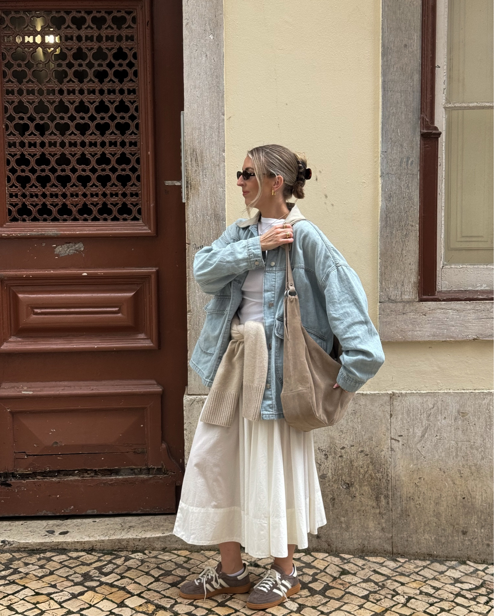 Denim jacket outfit for exploring Lisbon 🤍🇵🇹 

White skirt, free people, suede bag, denim jacket 

#LTKstyletip #LTKspring #LTKtravel