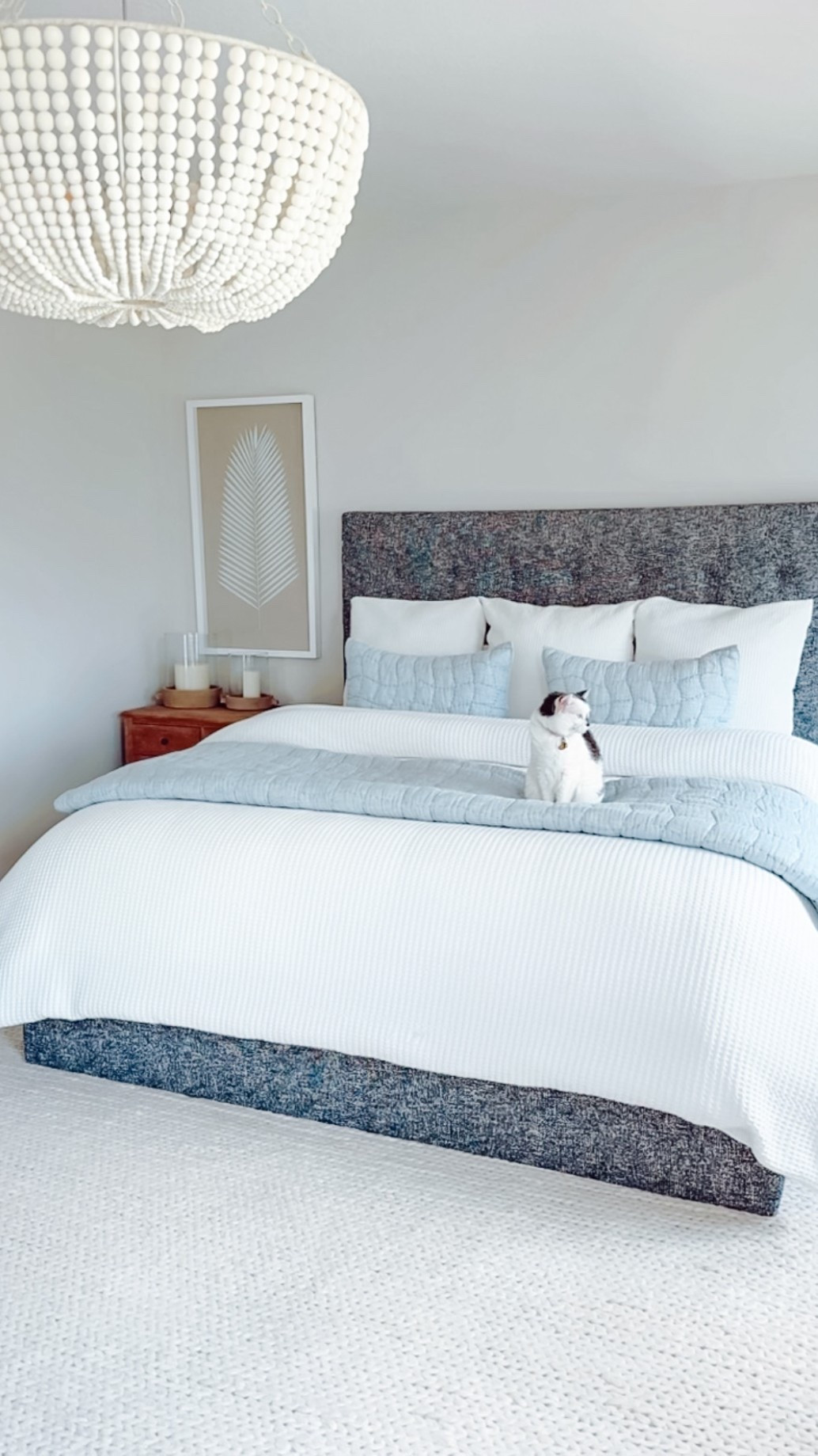 COASTAL HOME DECOR + BEDDING modern coastal home, master bedroom, beach home, white bedding, white comforter, blue bedding, pottery barn, Florida home, coastal bedroom, duvet, cozy, bright, airy, driftwood, natural wood nightstand, bedroom furniture, neutral bedroom, chandelier, candles, console table styling

#LTKHome #LTKmorningroutine #LTKSaleAlert
