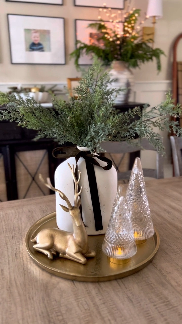 Christmas centerpiece idea! 

Christmas stems, gold tray, fair isle glass trees, gold reindeer, velvet ribbon, cedar stems

#LTKWatchNow #LTKSeasonal #LTKHoliday