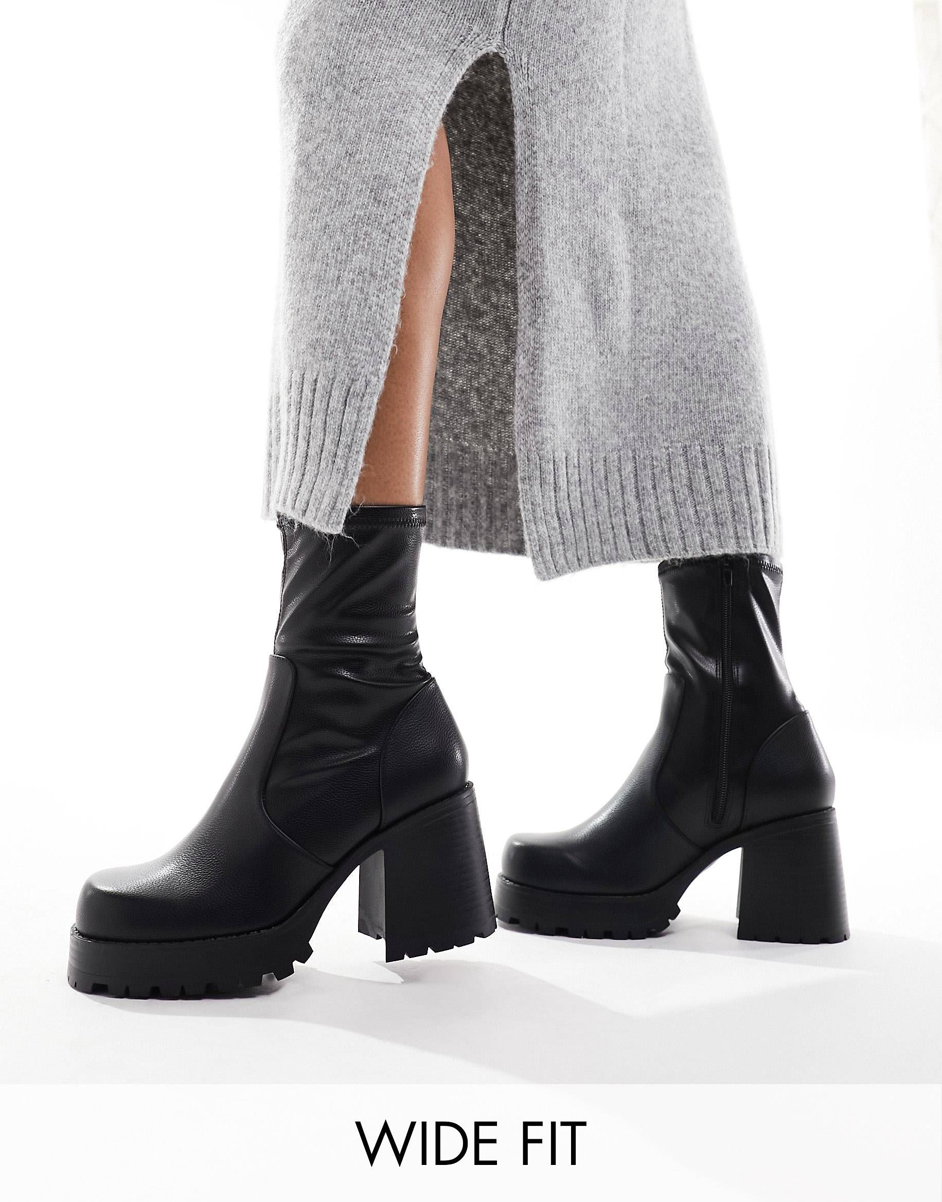 ASOS DESIGN Wide Fit Retreat mid-heeled sock boots in black | ASOS (Global)