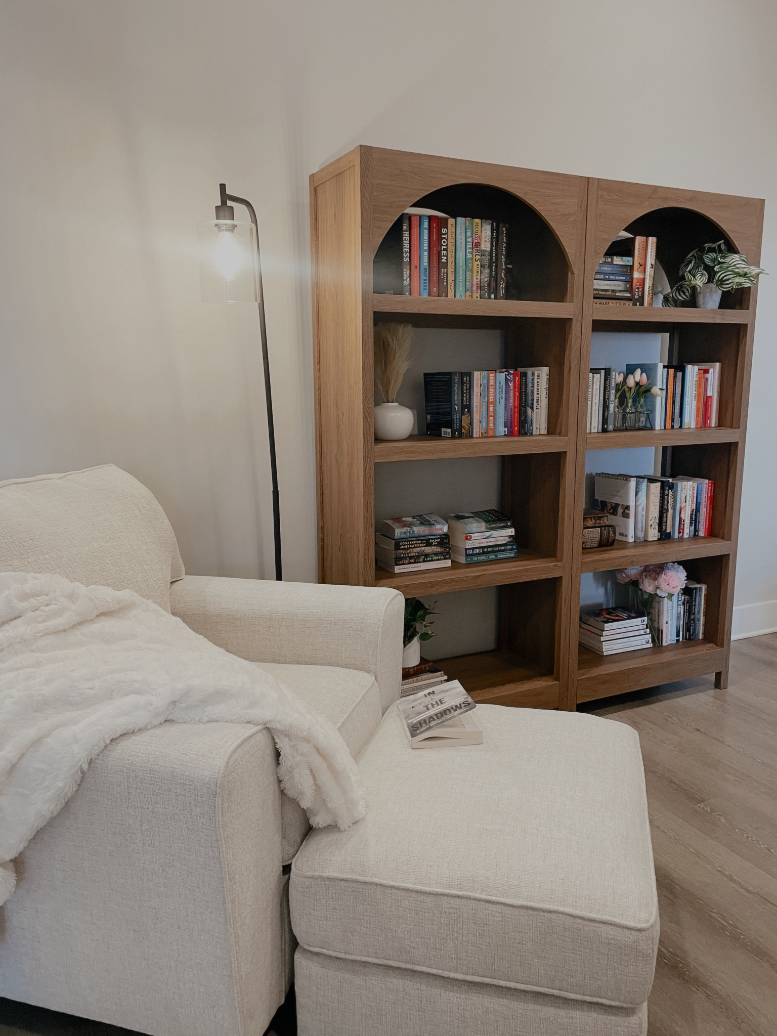 Reading corner with a cozy reading chair and bookcases 

#LTKhome