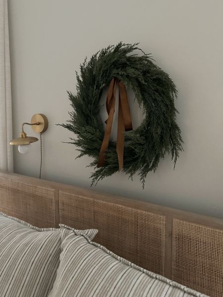 A pretty and realistic wreath in stock and 15% off with GET15. Under $50 with the code! It’s a larger wreath, just looks smaller on my large wall 😅

#LTKHoliday #LTKfindsunder50 #LTKsalealert