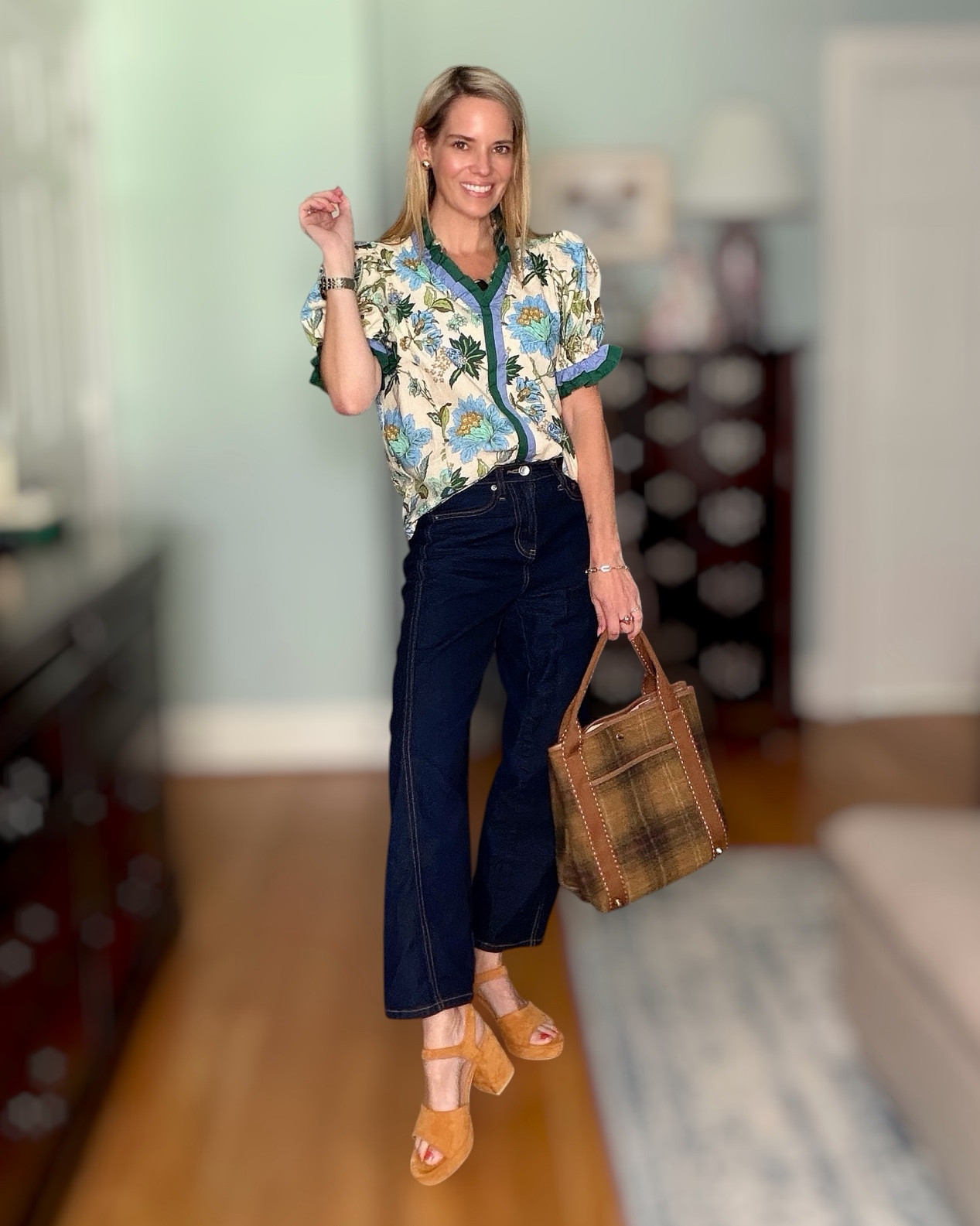 Fall Transition Floral 💙🌿

The prettiest floral top for an easy fall transition! 🌸💙 I love the mix of soft blue florals, green trim, and feminine ruffle details paired with classic dark denim. ✨

Add cognac accessories and suede heels for a polished, effortless look that works for lunch dates, errands, school drop-off, or a casual day out. 🤎👖 These wide-leg jeans are such a great wardrobe staple, too!

Fall transition outfit | floral blouse | blue floral top | dark wash wide leg jeans | cognac handbag | suede heels | casual fall outfit | fall fashion for women | women over 40 fashion | classic fall style | feminine everyday outfit | preppy fall fashion | affordable fall outfit | fall wardrobe essentials | blue and green outfit

#LTKOver40 #LTKSeasonal #LTKootd