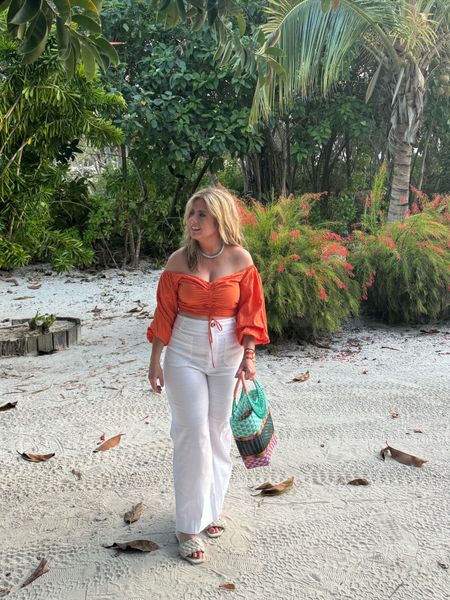 Scored this cripple top and pants from Nuuly but found similar pieces for you. The bag is a local Belize find 😍

#LTKmidsize #LTKtravel #LTKstyletip