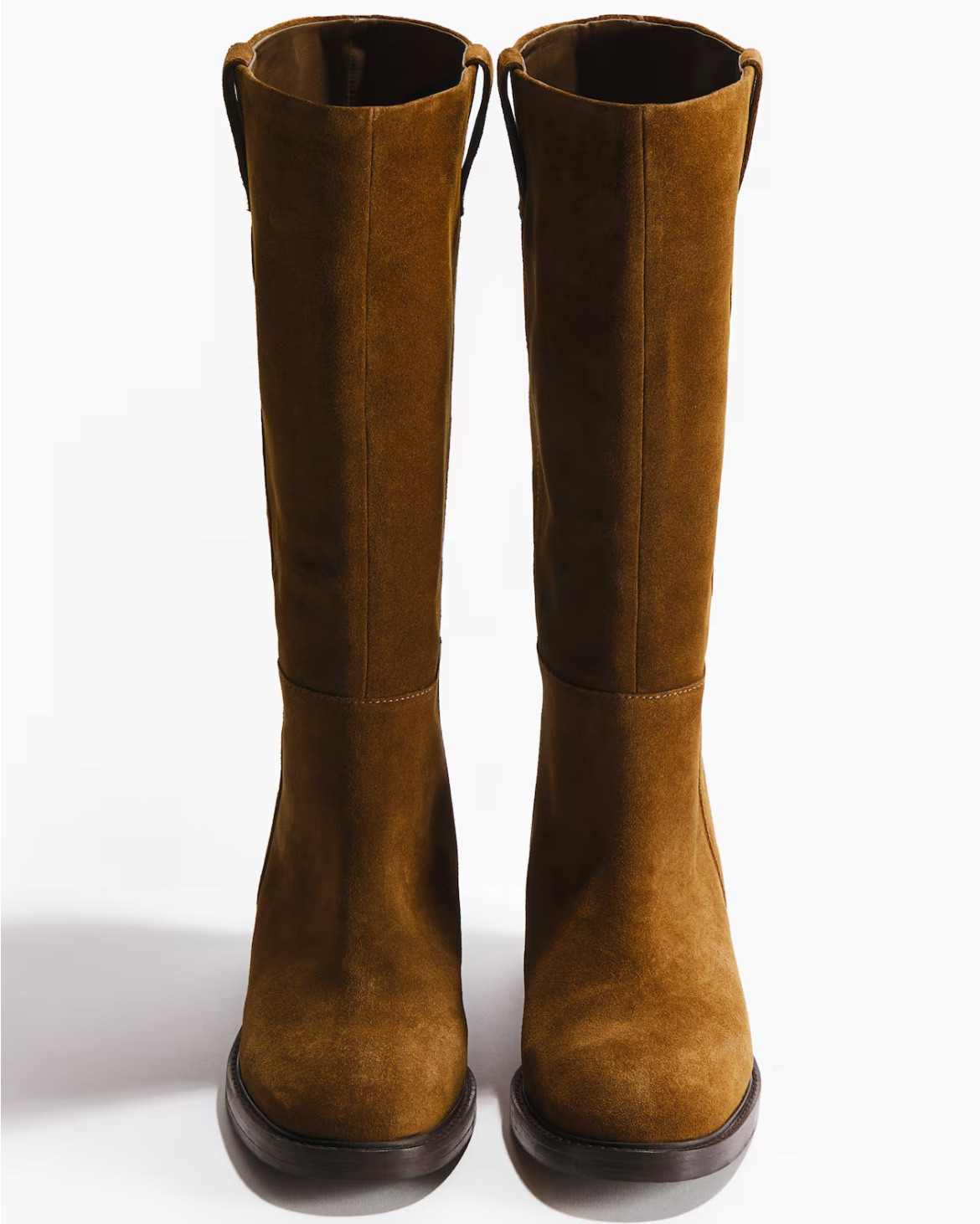 Brown suede knee high boots 

#LTKSeasonal