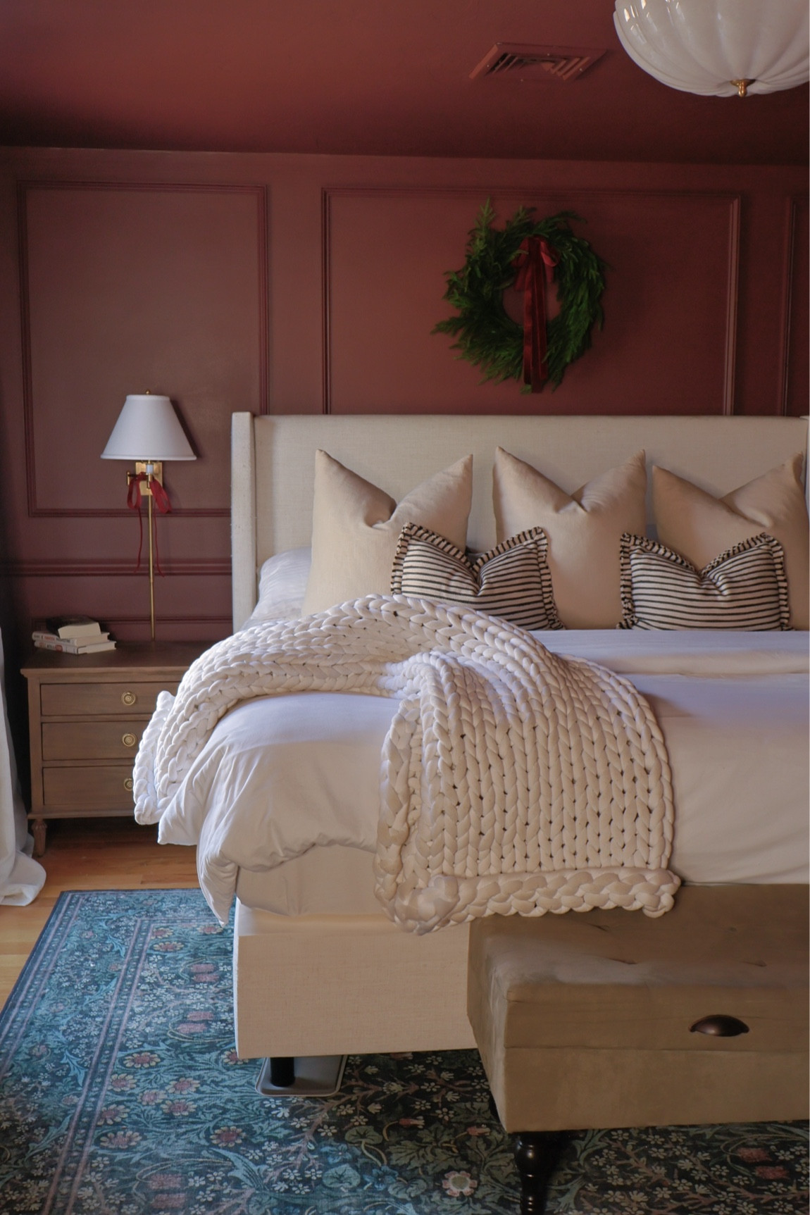 My cozy primary bedroom decorated for Christmas with a wreath above the bed and velvet bows on the wall sconces! 🌲✨🧣🕯️🦌🎅🏼

#LTKHome #LTKSeasonal #LTKHoliday