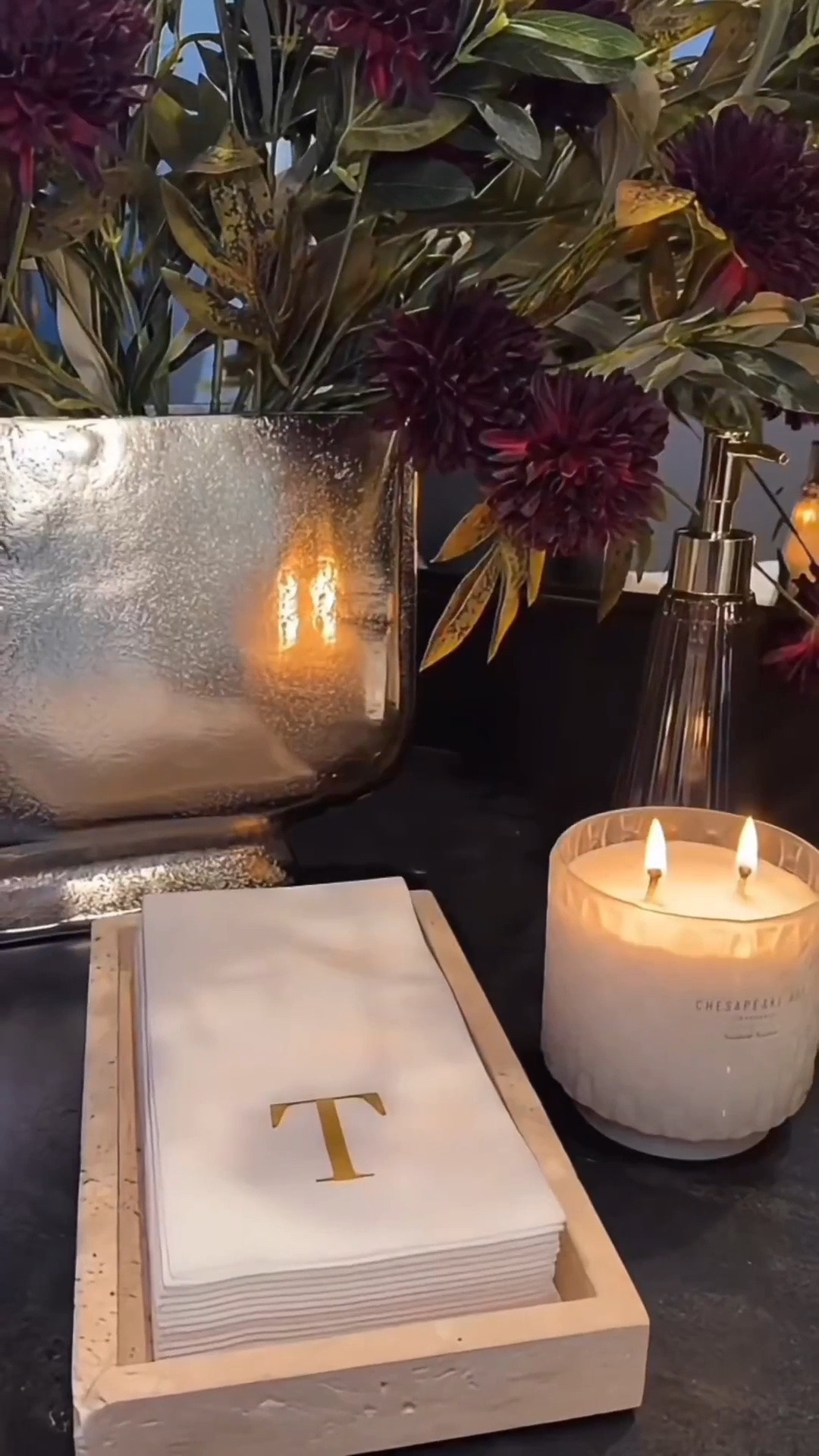 Looks expensive? Isn’t. Extravagant? Absolutely. This luxe look is surprisingly easy to recreate. Personalized disposable napkins, a unique vase with florals, and a warm candle instantly elevate your bathroom into a polished, high‑end space. Small curated touches make all the difference and keep everything feeling refined.

Summerthompsonstyles

---

neutral bathroom decor luxe home styling modern florals elevated accents cozy candlelight affordable luxe look home refresh interior inspiration

#LTKU #LTKHome #LTKdayinmylife
