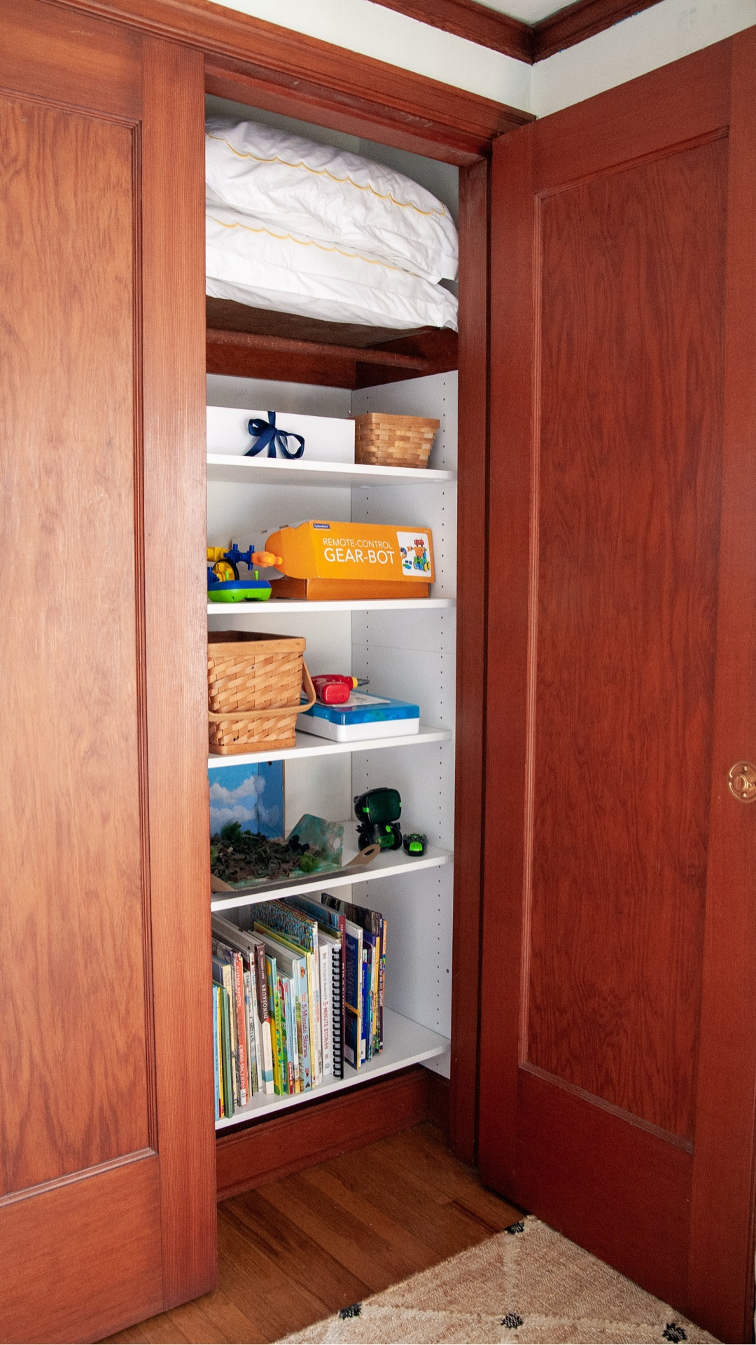 Otto’s room had almost no storage, so we just kept stuff sort of pushed against the walls on the floor. 🤦‍♀️ Until I had an idea. We also didn't use his closet at all, but I found a really simple $129 closet system and my friend's husband helped install it 🙏❤️. He custom fit it into this kind of funky old closet, even working around the original angled shoe shelf (we have them in almost all our closets). We didn’t need the top part of the shelf unit, or the other bars that it came with, but we even got an extra bar out of it that I’ve been hanging Lucy‘s summer dresses on. ￼

He’s a 7-year-old boy so he doesn’t have any clothes that need to go in the closet, but now we have room for all his books and toys that we totally didn't before. So simple and gave us so much storage!

#LTKmomlife #LTKPetite