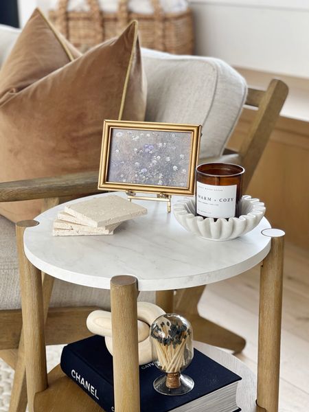 HOME \ new $89 side table + styling it out with my favorite decor pieces: marble ruffle bowl, stone coasters, mini canvas art, wood knot, matches and coffee table book!

Walmart
Amazon
Living room 
Spring 

#LTKfindsunder50 #LTKhome #LTKfindsunder100