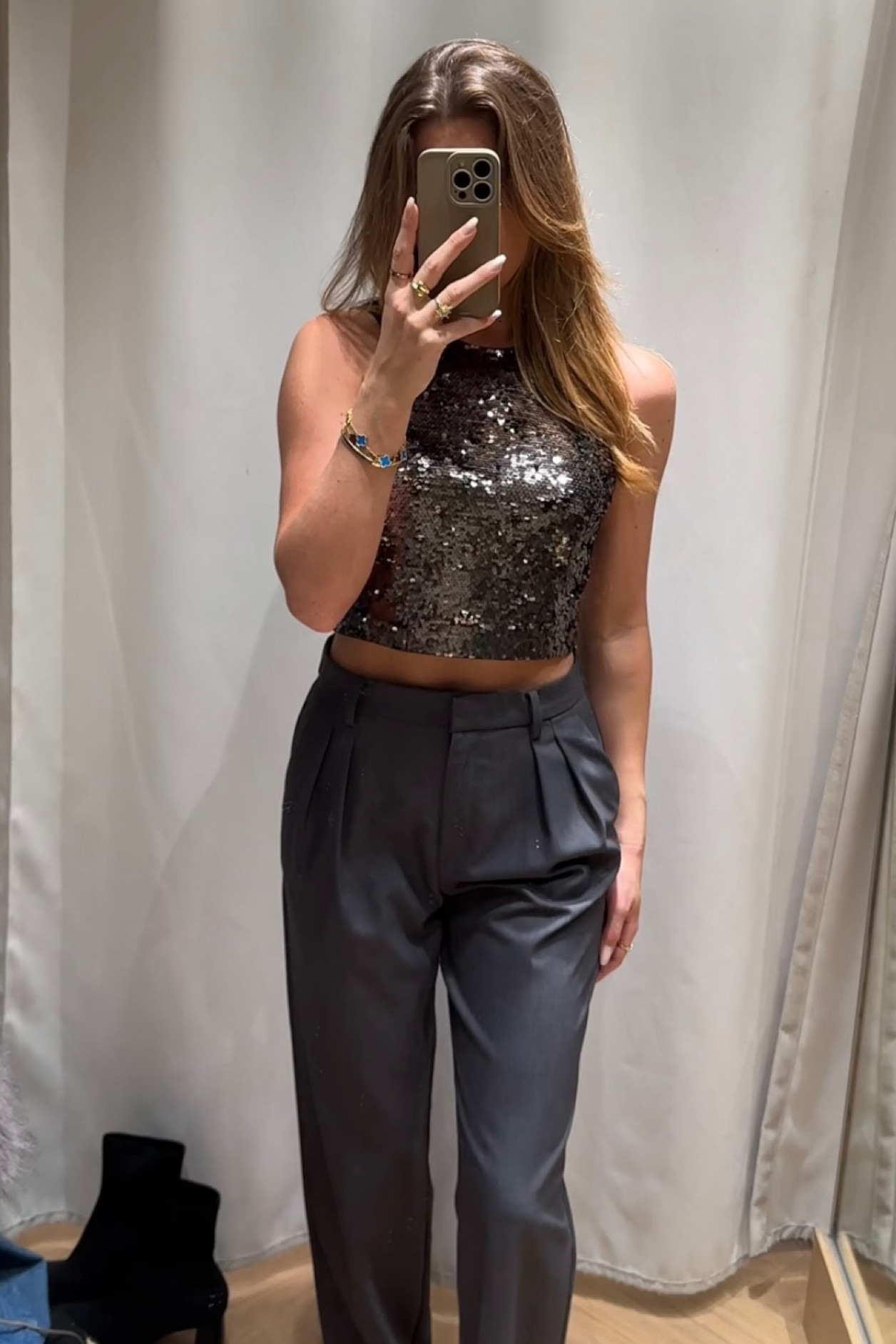 crop top with sequins and gray trousers, fitted at the top. 

Christmas party outfit inspiration

Wearing both size S

#LTKSeasonal #LTKHoliday #LTKparties