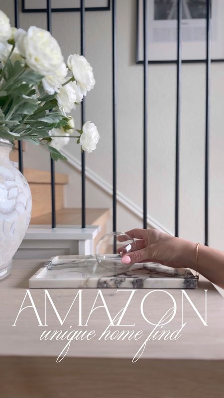 Amazon everlasting candle! Love this unique home find, it’s so cool! Comes with the candle oil and scent to add as much or as little as you want. Would make the perfect housewarming gift and is a fun piece to light before guests come over!

#LTKFindsUnder100 #LTKSaleAlert #LTKHome