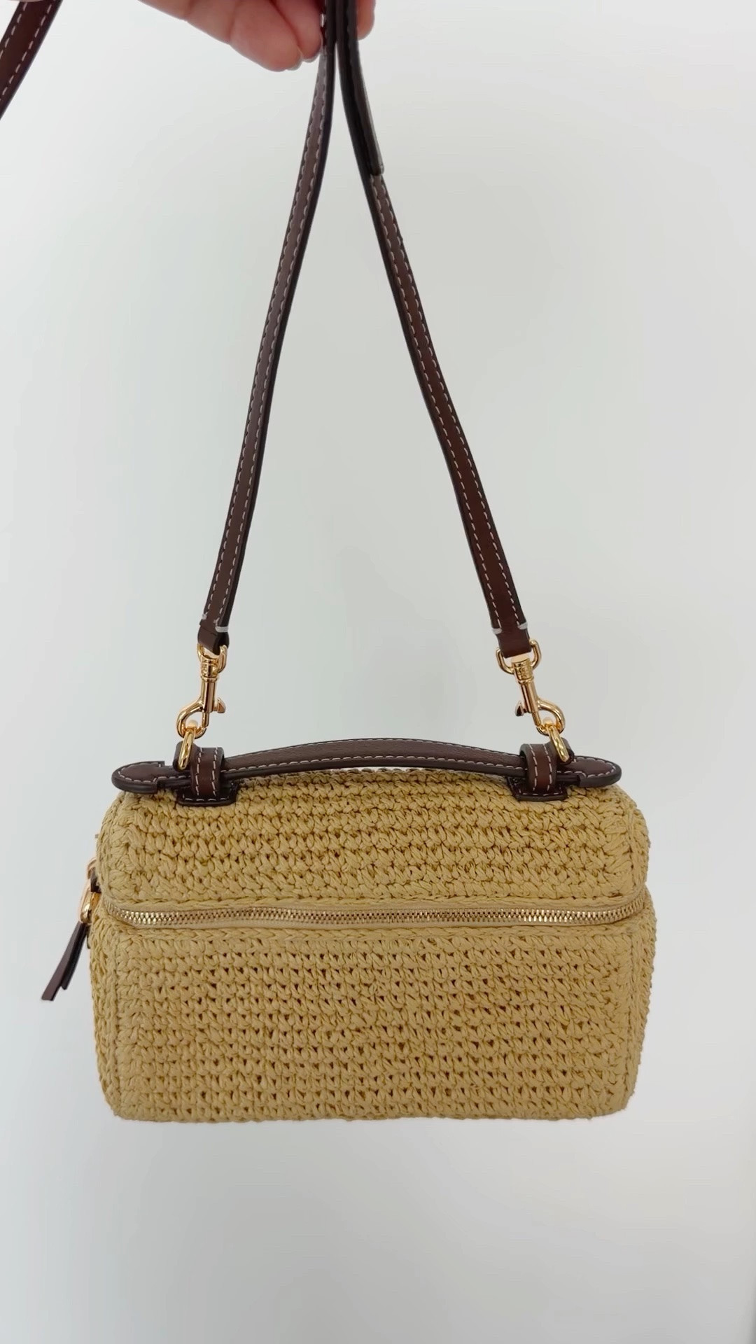 The cutest raffia crossbody bag that’s perfect for vacation outfits beach, resort wear, and everyday summer outfits. This Tory Burch bag has been a favorite this season and goes with just about everything! You can also remove the long strap and use it wth the top handle as a clutch bag.

#LTKOver40 #LTKSeasonal #LTKTravel