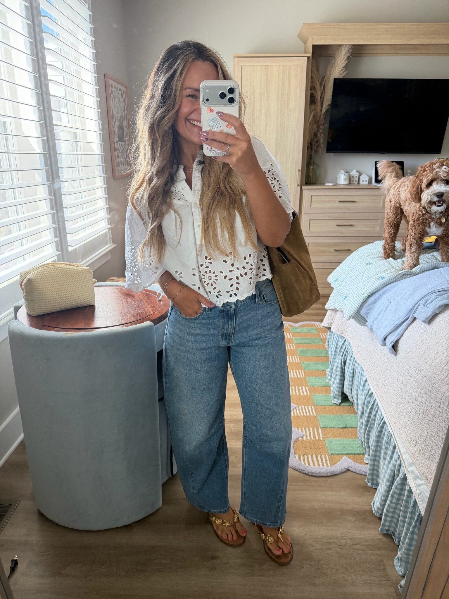 Eyelet top + barrel jeans = my current uniform until it's actually cold 🐚 At 5'2", I thought barrel jeans would swallow me, but this cropped length hits right at the ankle, so no hemming needed. The top is boxy and short, so it sits right at the waistband. Sandals have the cutest little gold shells. Wearing a [size] in the jeans and [size] in the top. #petitefashion #falltransition #coastalstyle

#LTKPetite #LTKdayinmylife #LTKgrwm