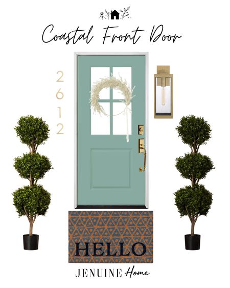 Coastal front door. Mint. Topiary tree. Welcome mat. Coastal wreath. Boho wreath. Gold hardware. Gold handle. Gold lamp outdoor light. Front porch light. Gold metal house numbers. White wreath  