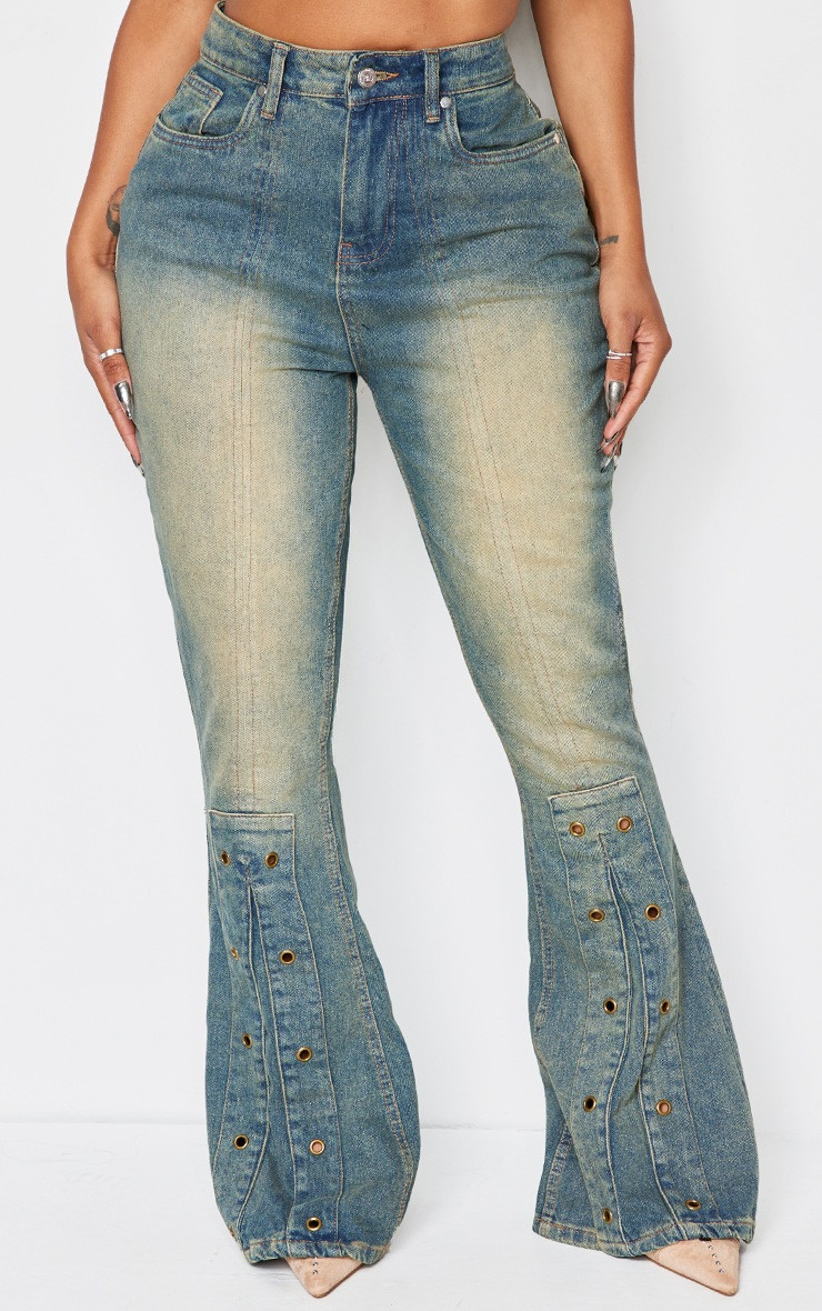 Shape Indigo Blue Wash Denim Eyelet Detail Flare Jeans | PrettyLittleThing US