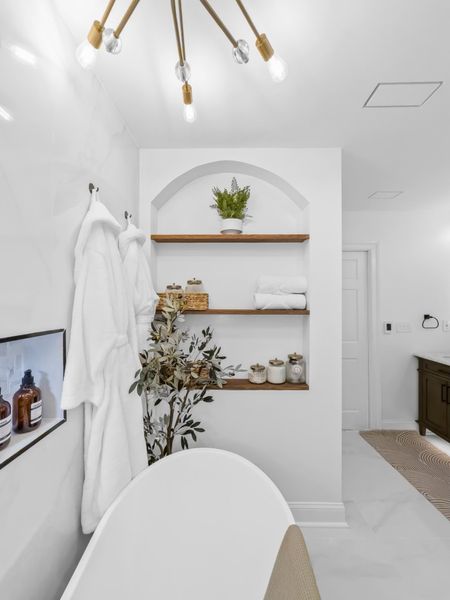 Modern luxe bathroom transformation! 

Would you considering creating a relaxing, at-home spa area in your master bathroom? 🛀 #interiordesign

#LTKsalealert #LTKhome

#LTKSaleAlert #LTKHome