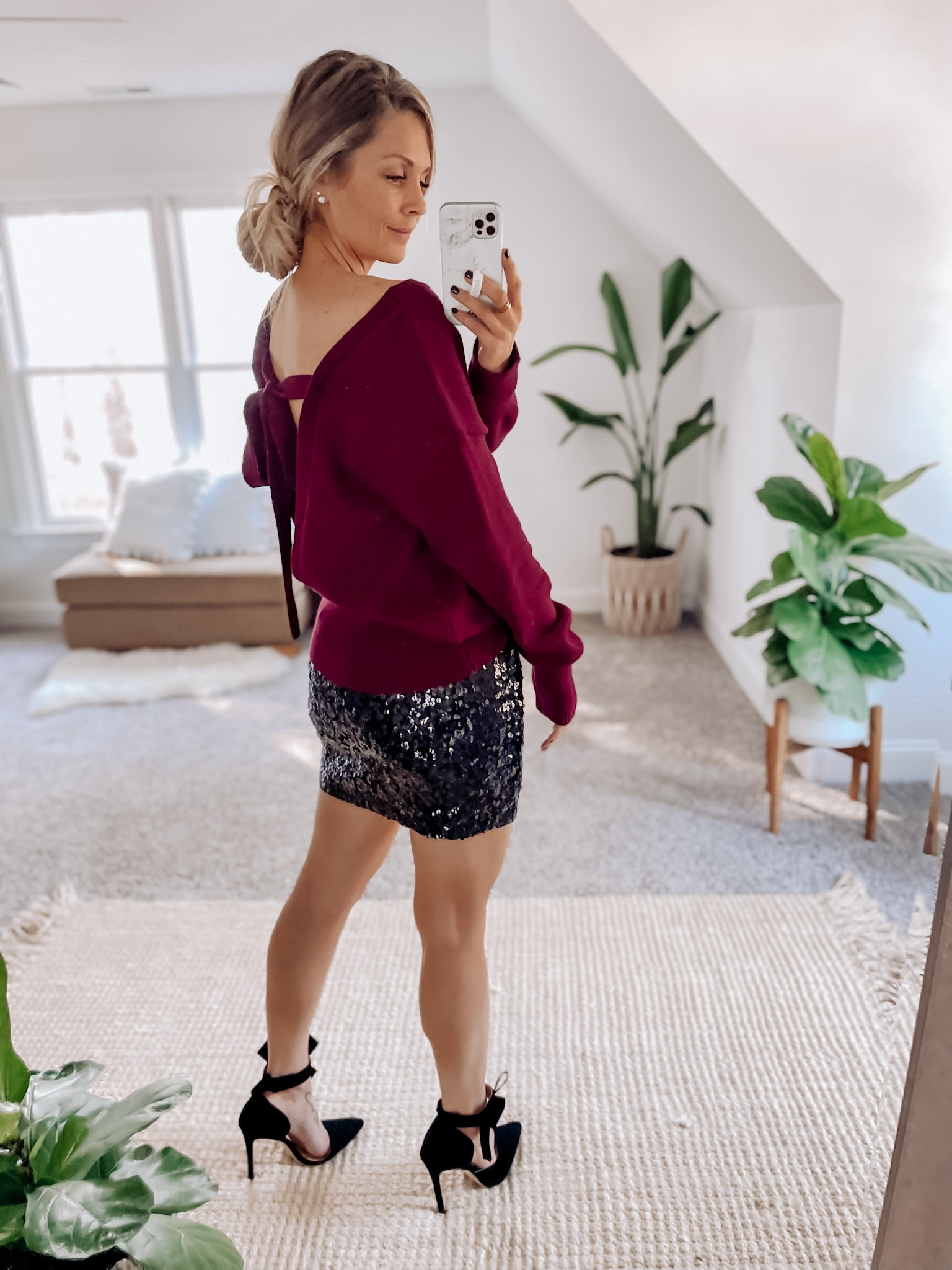 Nothing says HOLIDAYS like sequins and bows!! I LOVE this sequin skirt!! It fits true to size, pull on and very stretchy. It is so soft on the inside you don’t even notice the sequins on the outside. Paired with these cute bow heels makes the perfect statement for any holiday Christmas party. 

Tags: holiday outfit - holiday fashion - black bow heels - dressy Christmas outfit - Christmas party outfit - Christmas party fashion - cute Christmas outfit - holiday skirt sequin mini skirt - oversized sweater - bow tie backless sweater - backless sweater - maroon sweater 

#LTKHoliday #LTKGiftGuide #LTKSeasonal