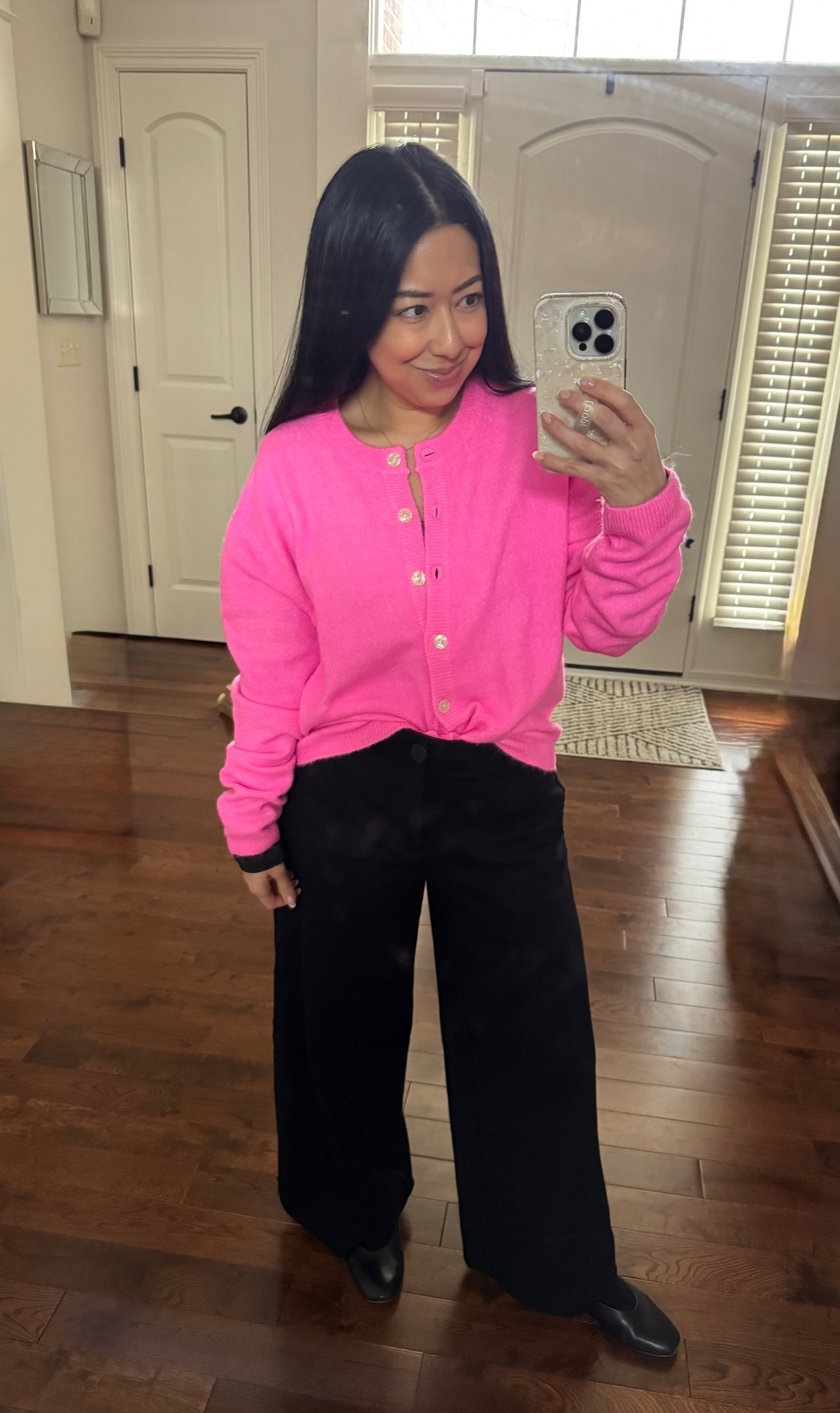Easy business casual work outfit. 
It’s still so cold here and this kept me warm!
Black wide leg pants - size down 1-2 sizes (I’m in size 0 and normally 4-6). 
Black Mary Jane flats (wearing socks bc my feet were freezing!!)  TTS. 
Pumiey long sleeve scoop neck top. - size up 1 (wearing size medium). 
Neon hot pink cardigan sweater (mine is target but sold out so linked a very similar option). - size small. 
Also linked my necklace (and a look for less) & my earrings  

#LTKdayinmylife #LTKPetite #LTKWorkwear