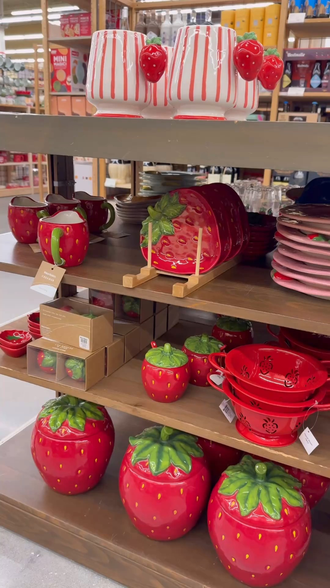 Strawberry kitchen and home decor at world market. Strawberry plates and dishes, salt and pepper shakers and vases 